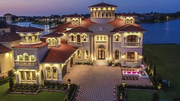 House with external lighting at dusk